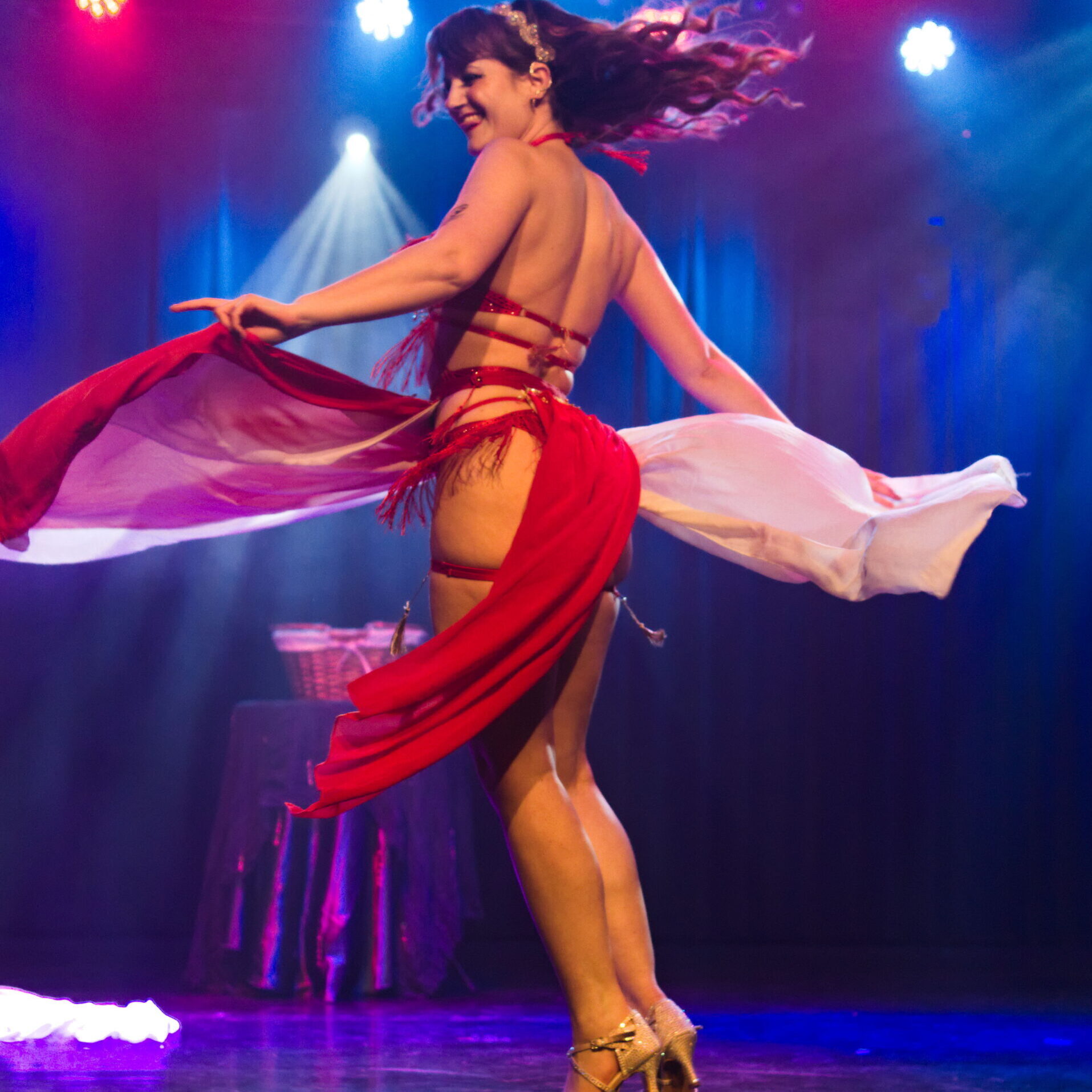 Alice Wonders performing burlesque act in VeilMoon Forest