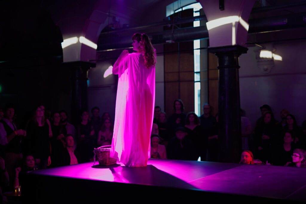 Alice Wonders performing on the edge of Veilmoon Forest